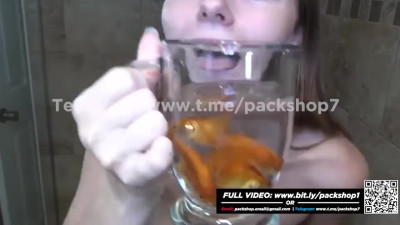 Evil white woman devours live fish in bathroom - vore giantess