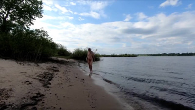 Exhibitionist Blonde Goes Nude on a River Beach