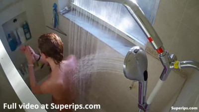 IPCAM – Busty American girl takes a long shower