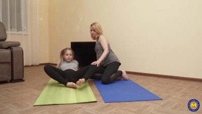18 year old babe taking a yoga class from a lesbian milf